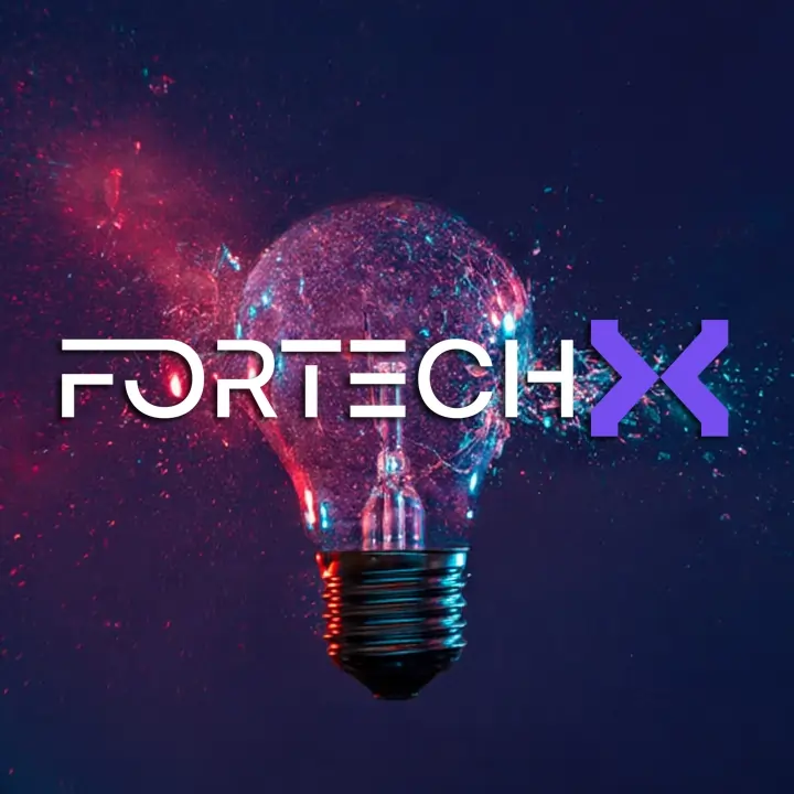 ForTechX team working on computers
